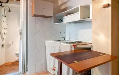 Cucina o angolo cottura di Amazing Apartment In Firenze