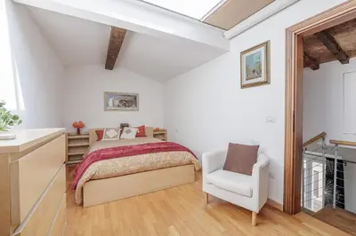 Letto o letti in una camera di The Bookhouse