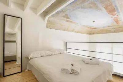 Letto o letti in una camera di Le Ruote, Charming Apartment