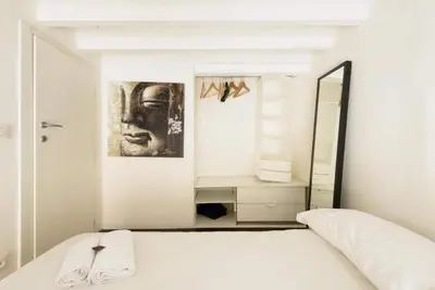 Letto o letti in una camera di Le Ruote, Charming Apartment