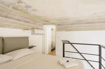 Letto o letti in una camera di Le Ruote, Charming Apartment