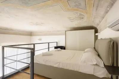 Letto o letti in una camera di Le Ruote, Charming Apartment