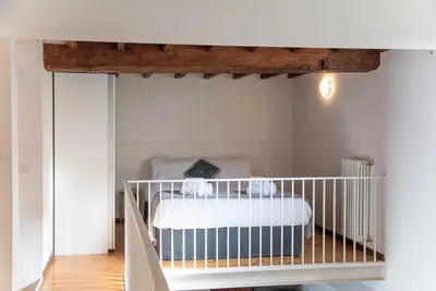 Letto o letti in una camera di Coco Places Apartments Santa Maria Novella, Centro Storico