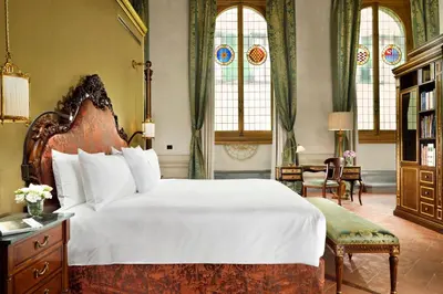 Letto o letti in una camera di Palazzo Portinari Salviati Residenza D'Epoca