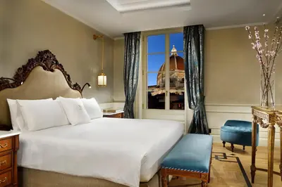 Letto o letti in una camera di Palazzo Portinari Salviati Residenza D'Epoca