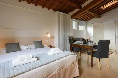 Letto o letti in una camera di Casa Barontini