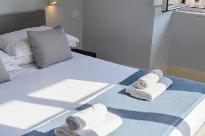 Letto o letti in una camera di Casa Barontini