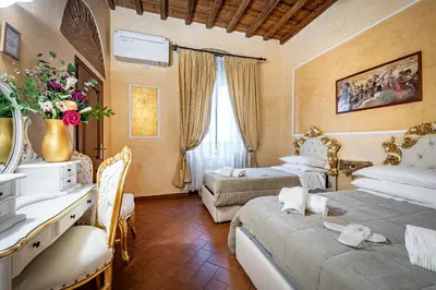 Letto o letti in una camera di Katti House - Florence's center