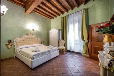 Letto o letti in una camera di Katti House - Florence's center