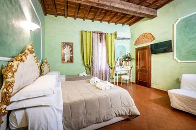 Letto o letti in una camera di Katti House - Florence's center