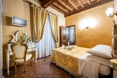 Letto o letti in una camera di Katti House - Florence's center