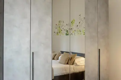 Letto o letti in una camera di Homelink Firenze - Charlotte
