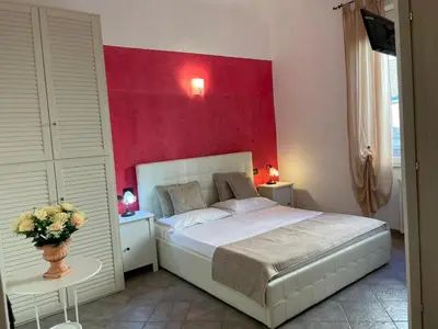 Letto o letti in una camera di Homelink Firenze - The Key