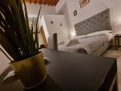 Letto o letti in una camera di B&B The Lux