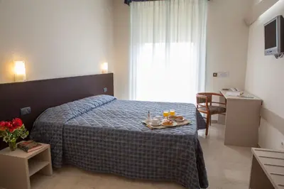 Letto o letti in una camera di AUTO PARK Hotel