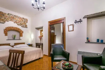 Letto o letti in una camera di Hotel Collodi Firenze