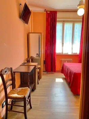 Letto o letti in una camera di Albergo Cinzia