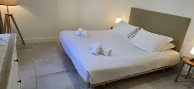 Letto o letti in una camera di Coco Places Rooms Santa Maria Novella, Centro Storico