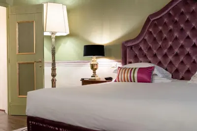 Letto o letti in una camera di Grand Hotel Cavour