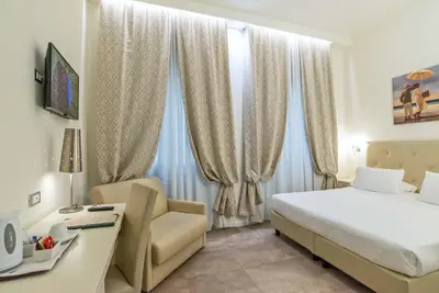 Letto o letti in una camera di Hotel Accademia