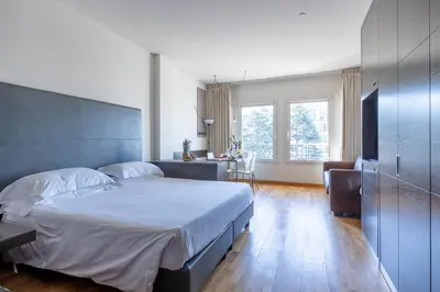 Letto o letti in una camera di Wall Art Hotel & Residence