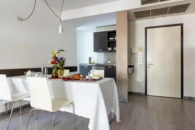 TV o dispositivi per l'intrattenimento presso Wall Art Hotel & Residence