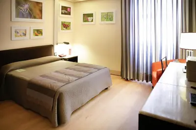 Letto o letti in una camera di Art Hotel Museo