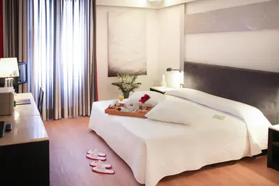 Letto o letti in una camera di Art Hotel Museo