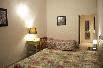 Letto o letti in una camera di Hotel Medici