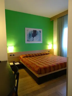 Letto o letti in una camera di Hotel I Cedri