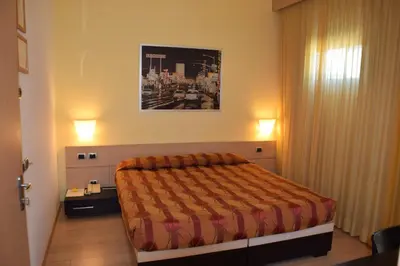 Letto o letti in una camera di Hotel I Cedri