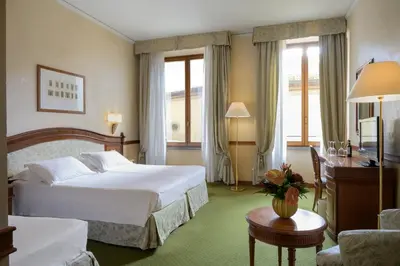 Letto o letti in una camera di Hotel degli Orafi