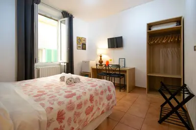 Letto o letti in una camera di Althea Rooms