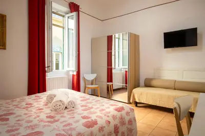 Letto o letti in una camera di Althea Rooms