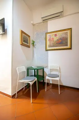 Area soggiorno di Althea Rooms