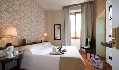 Letto o letti in una camera di Hotel De La Pace, Sure Hotel Collection by Best Western