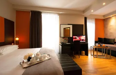 Letto o letti in una camera di Hotel De La Pace, Sure Hotel Collection by Best Western