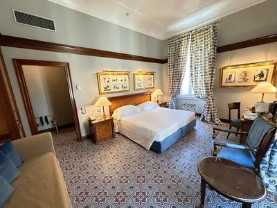 Letto o letti in una camera di Hotel Albani Firenze