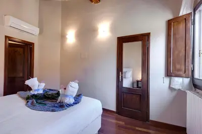 Letto o letti in una camera di Woodie Apartment by Mamo Florence