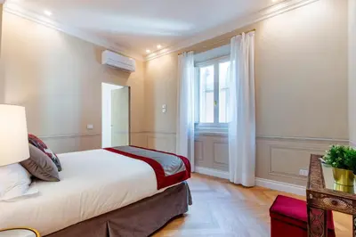 Letto o letti in una camera di Genteel Home Via della Spada