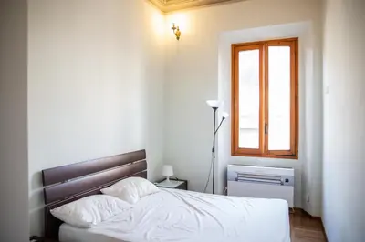 Letto o letti in una camera di Nice Apartment Near The Basilica of San Lorenzo