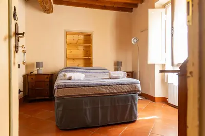 Letto o letti in una camera di B&B Air Green Serragli