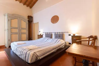 Letto o letti in una camera di B&B Air Green Serragli