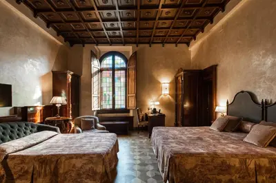 Letto o letti in una camera di Grand Hotel Baglioni