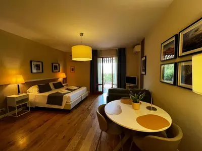Letto o letti in una camera di Residence Poggio Golf Chianti Firenze
