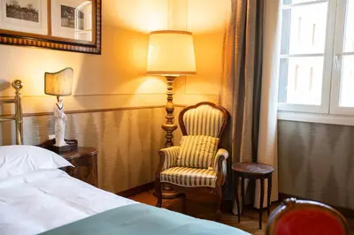 Letto o letti in una camera di Hotel Pendini
