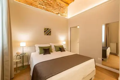 Letto o letti in una camera di Atelier Altafronte