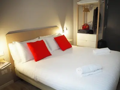 Letto o letti in una camera di Hotel Centro