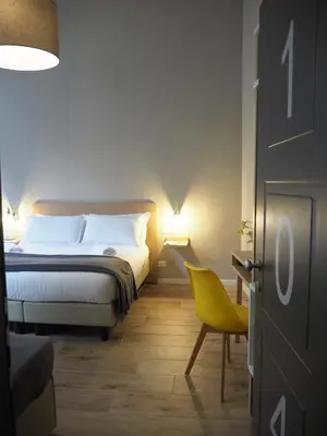 Letto o letti in una camera di Hotel Centro