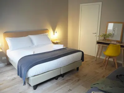 Letto o letti in una camera di Hotel Centro